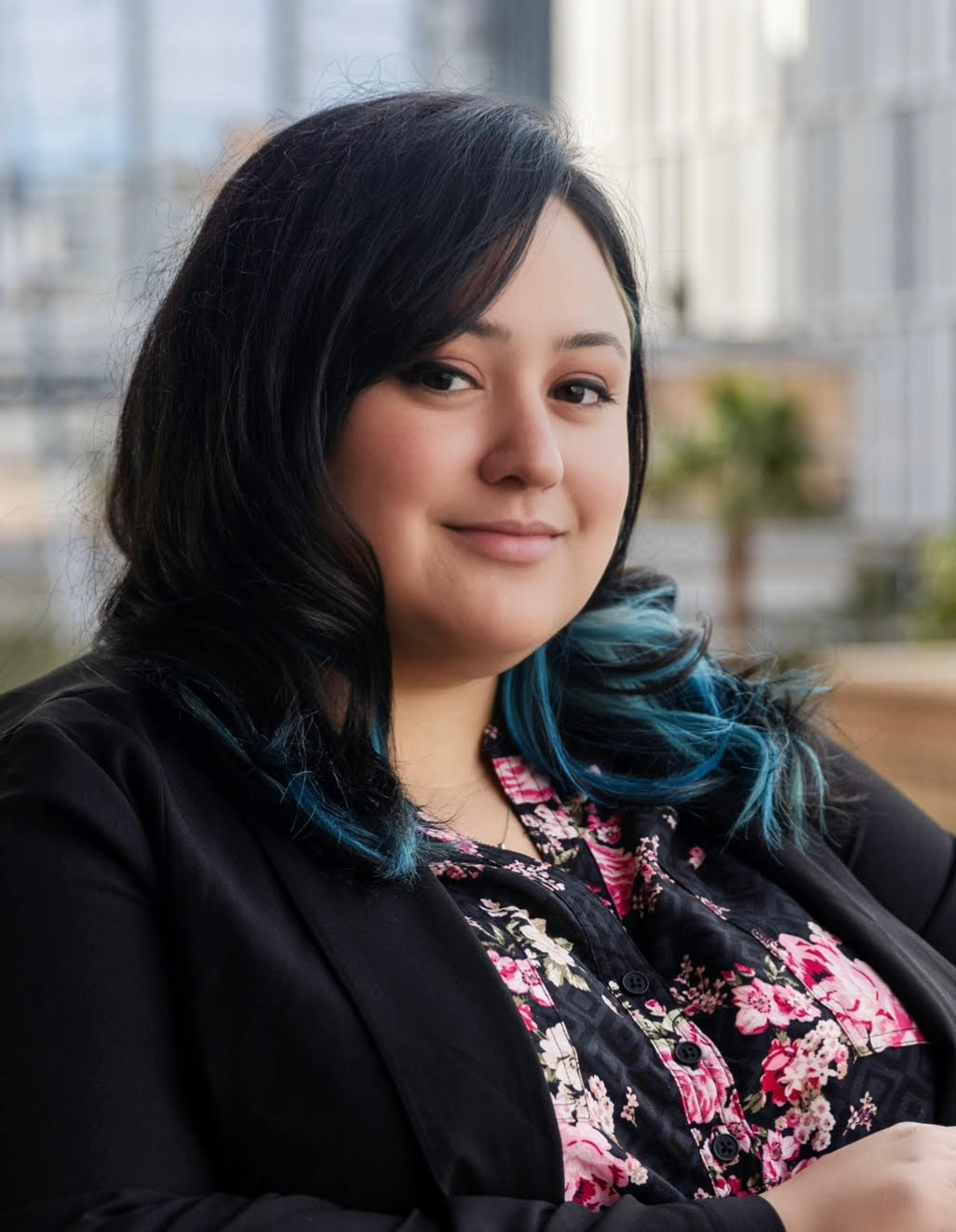 Monique Iniguez, multimedia artist and digital marketing specialist based in Phoenix, Arizona, smiling.